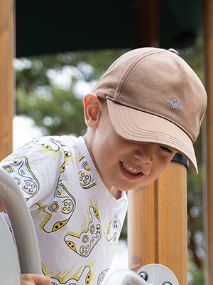 A boy looking out from a UniPlay unit.
